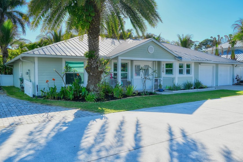 Live the ultimate coastal life in this Key West-style retreat - Beach Home for sale in Jupiter, Florida on Beachhouse.com