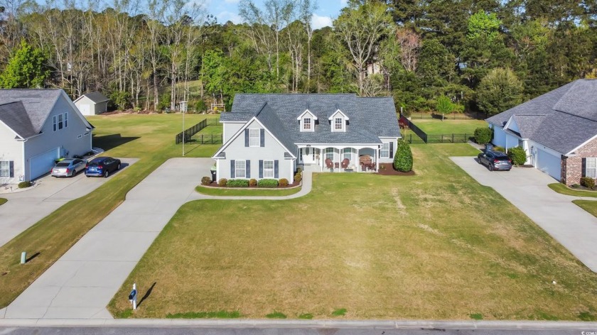 This gorgeous home sits on just over half an acre and is an - Beach Home for sale in Longs, South Carolina on Beachhouse.com