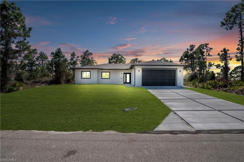 THIS IS NOT YOUR TYPICAL HOME IN LEHIGH ACRES. Built with - Beach Home for sale in Lehigh Acres, Florida on Beachhouse.com