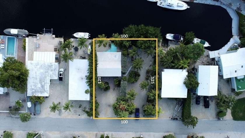 Discover the convenience of coastal living with this waterfront - Beach Lot for sale in Plantation Key, Florida on Beachhouse.com