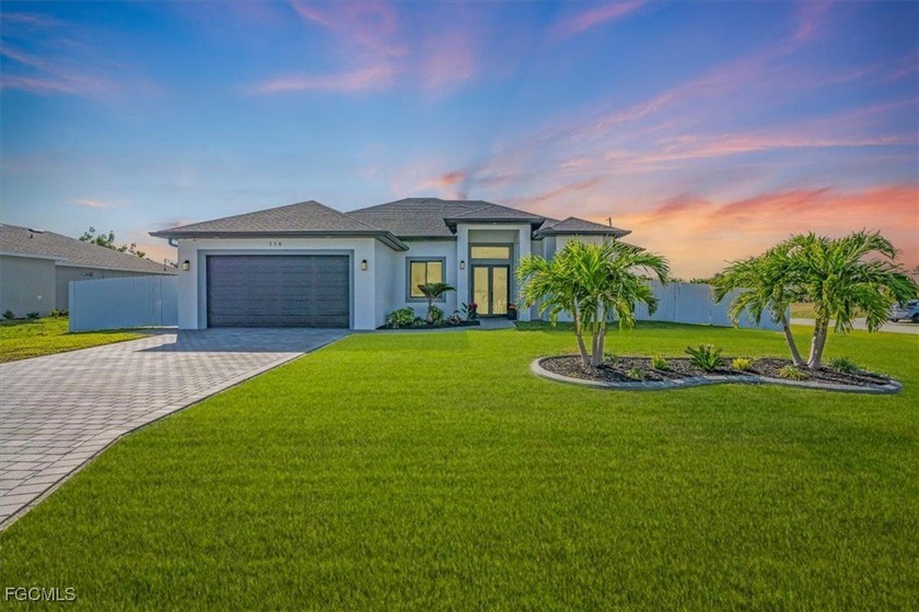 Completed in 2022, this 4-bedroom, 2.5-bath home sits on a - Beach Home for sale in Cape Coral, Florida on Beachhouse.com
