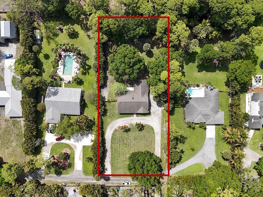 Welcome to your private slice of paradise! Nestled on a - Beach Home for sale in West Palm Beach, Florida on Beachhouse.com