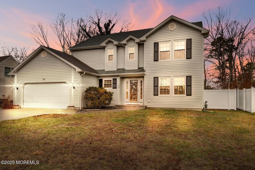 Welcome to this 4-bedroom, 2.5-bathroom Colonial home in the - Beach Home for sale in Manahawkin, New Jersey on Beachhouse.com