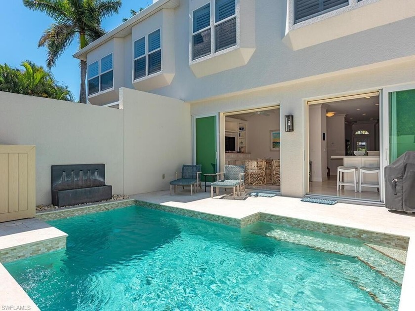 Ideally positioned in the coveted heart of Old Naples, this - Beach Home for sale in Naples, Florida on Beachhouse.com