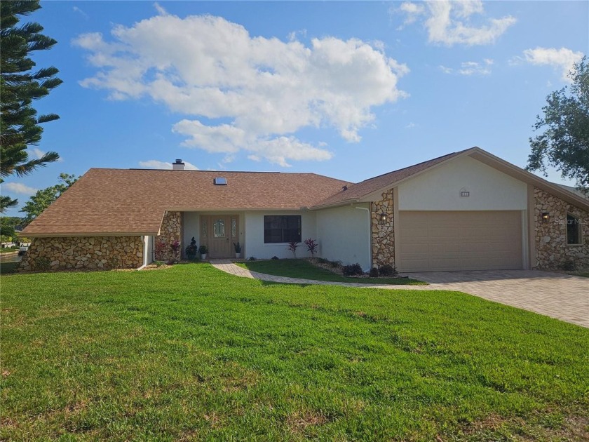 Stunning 3-Bedroom, 2-Bath Pool Home on Saltwater Canal in - Beach Home for sale in Palm Coast, Florida on Beachhouse.com