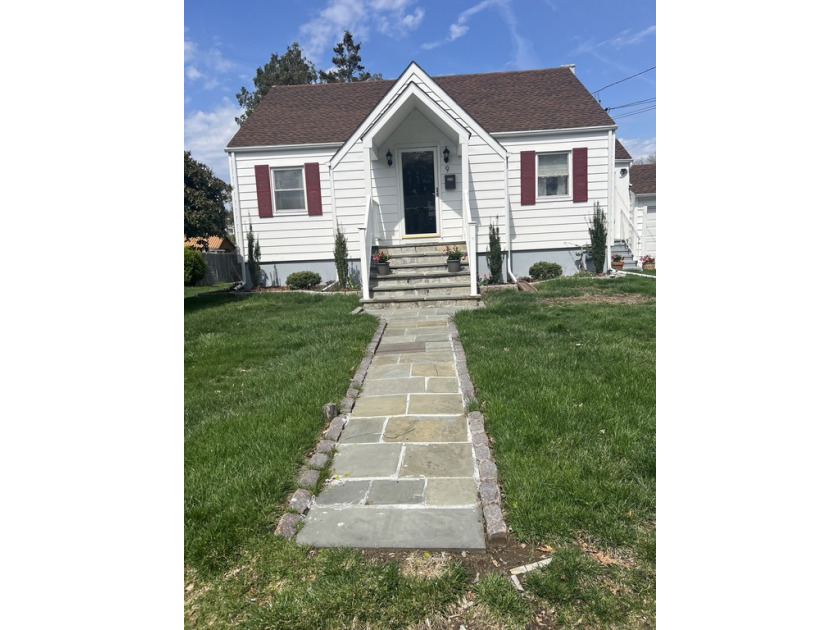 Located in the charming neighborhood of Cranberry, this home is - Beach Home for sale in Norwalk, Connecticut on Beachhouse.com