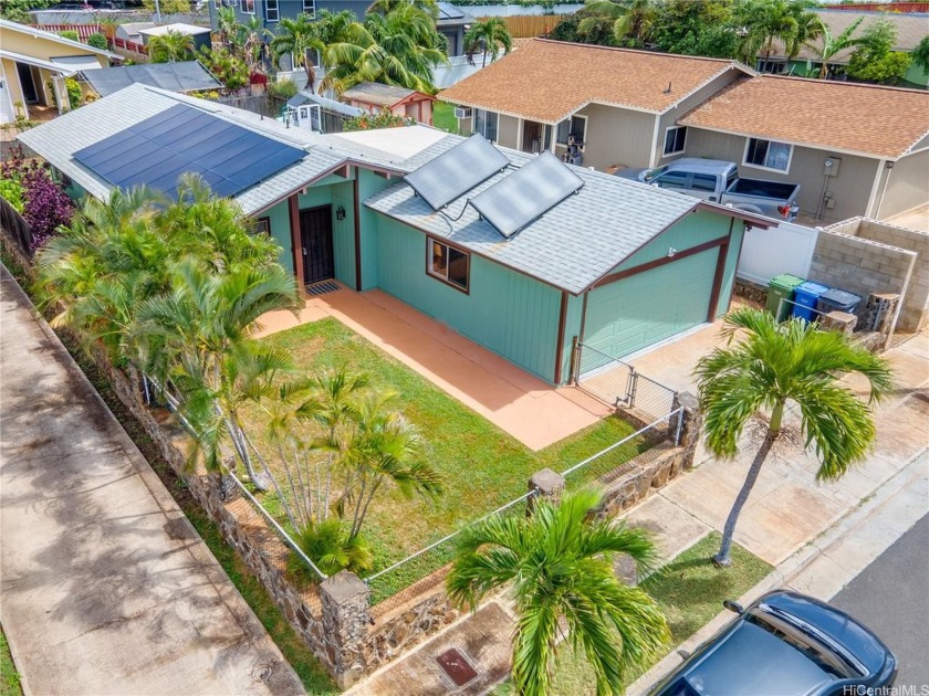 Super cute three-bedroom, two-bathroom home with huge backyard - Beach Home for sale in Waianae, Hawaii on Beachhouse.com