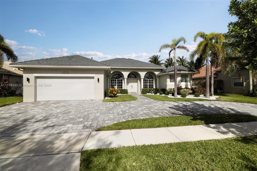 Experience luxury and tranquility in this stunning lakefront - Beach Home for sale in Pembroke Pines, Florida on Beachhouse.com