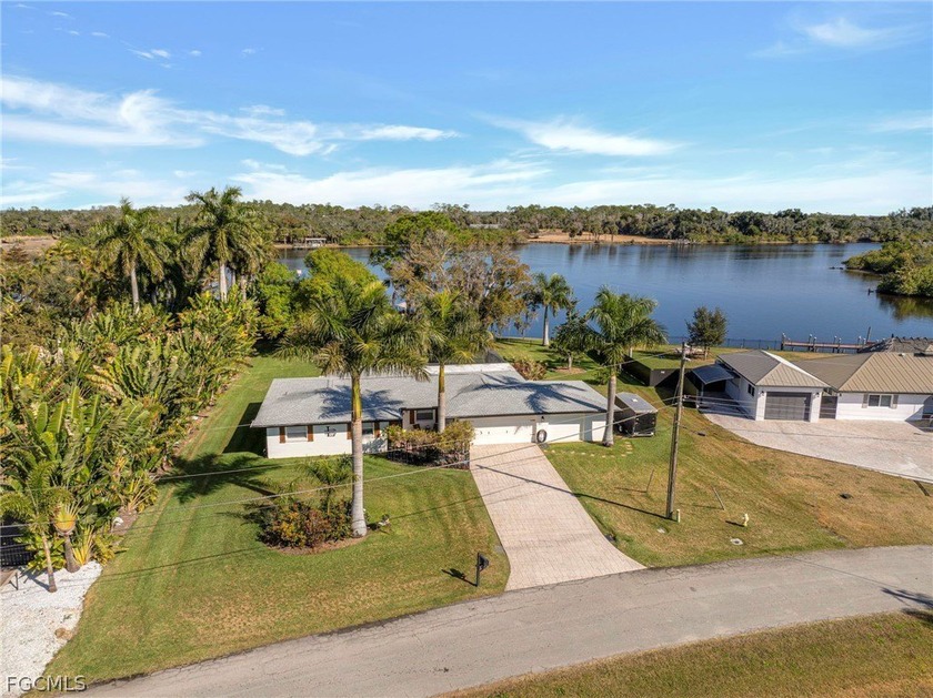 Experience true Southwest Florida waterfront living with this - Beach Home for sale in Fort Myers, Florida on Beachhouse.com