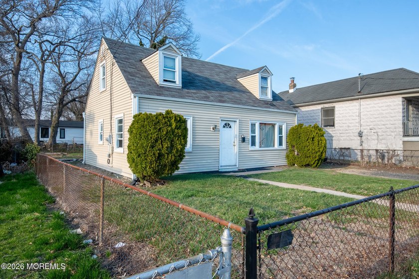 Charming 4-bedroom, 2-bath Cape Cod located in an up-and-coming - Beach Home for sale in Neptune, New Jersey on Beachhouse.com