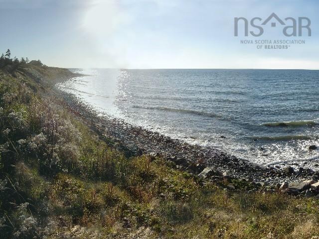 Discover serenity on this hilltop oceanfront lot on the - Beach Lot for sale in Sandford,  on Beachhouse.com