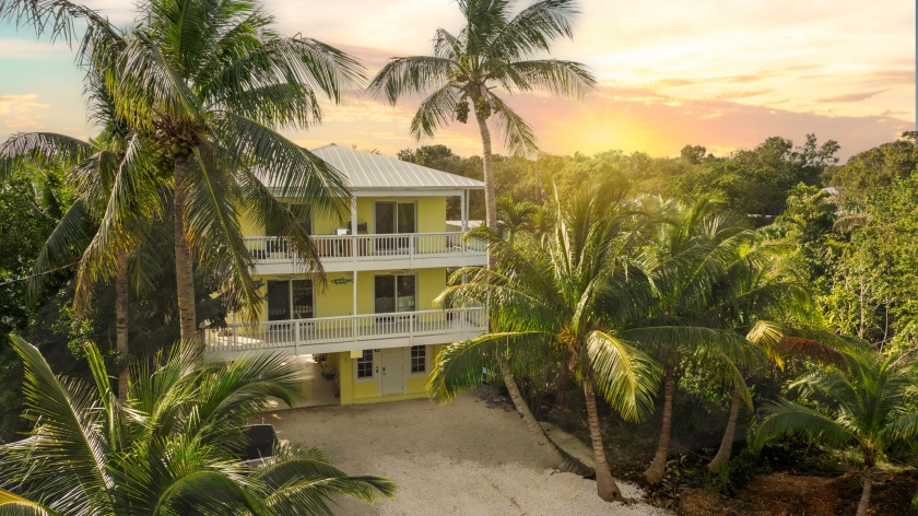Experience the essence of tropical living in this enchanting Key - Beach Home for sale in Key Largo, Florida on Beachhouse.com