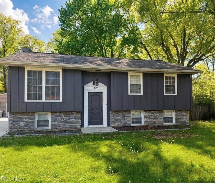 This spacious bi-level home offers 4 bedrooms, 2 full bathrooms - Beach Home for sale in Vermilion, Ohio on Beachhouse.com
