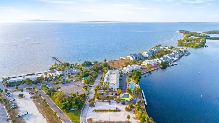 Turnkey Coastal Retreat with Sunrise Lagoon & Water Views in - Beach Condo for sale in Ruskin, Florida on Beachhouse.com