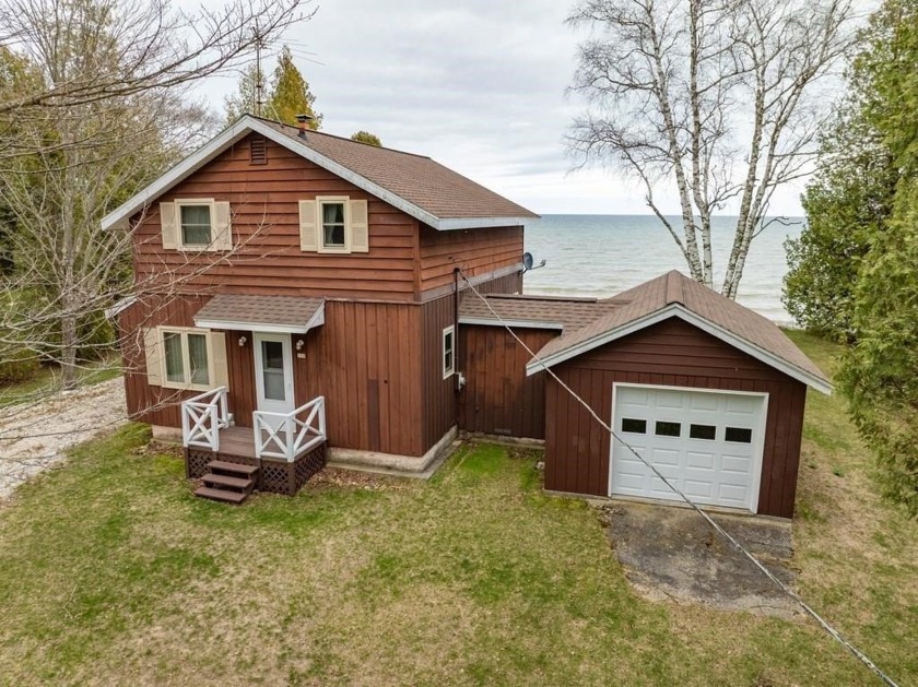 Wake up to colorful sunrises over Lake Michigan with the privacy - Beach Home for sale in Algoma, Wisconsin on Beachhouse.com