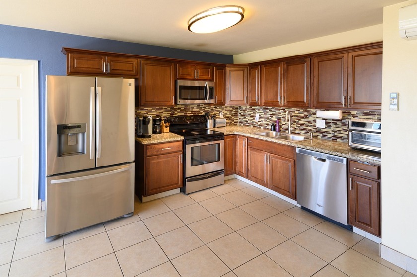 Walk to the the ocean . . . surf, snorkel or paddle? Located - Beach Condo for sale in Kihei, Hawaii on Beachhouse.com