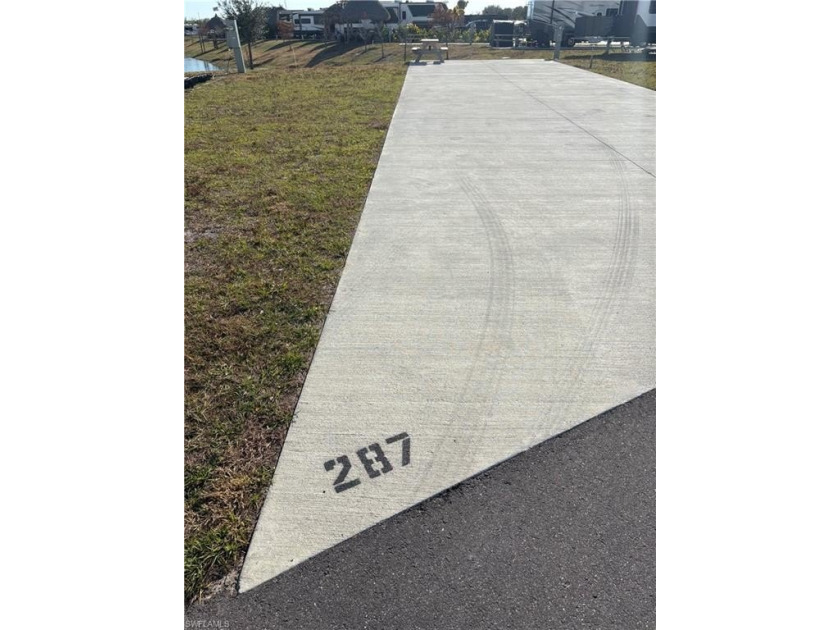 Welcome to Lot 287, an exceptional corner lakefront RV site in - Beach Lot for sale in Punta Gorda, Florida on Beachhouse.com