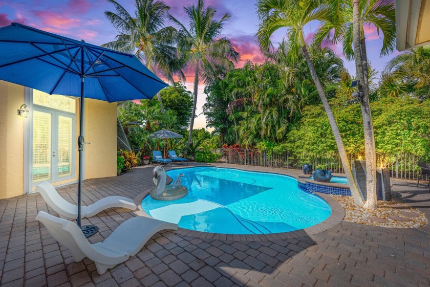 This 3BR/3BA/3CG + den home is a show stopper. Volume ceilings - Beach Home for sale in Palm City, Florida on Beachhouse.com