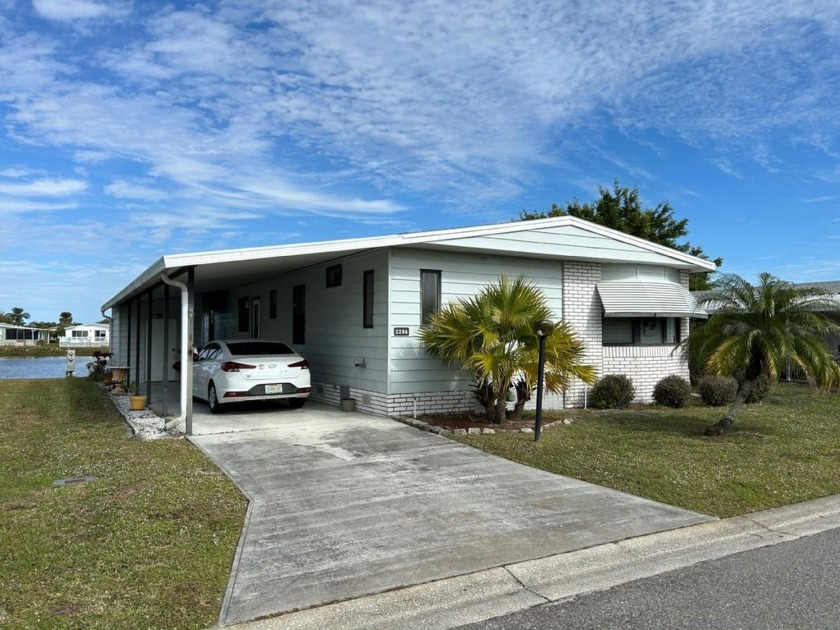 This partially furnished 2x2 on the lake is a steal! Sitting - Beach Home for sale in Melbourne, Florida on Beachhouse.com