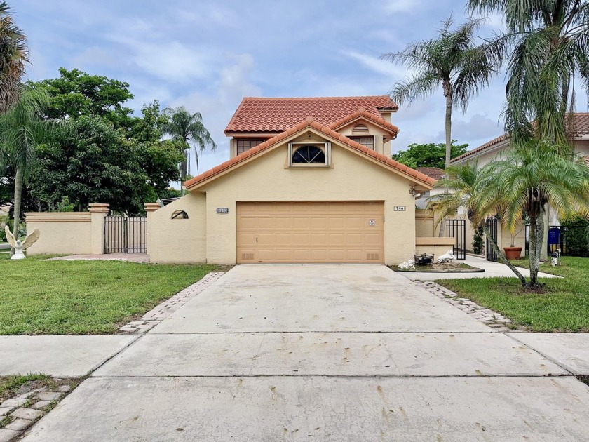 Welcome home to this updated home on a large corner lot with a - Beach Home for sale in Deerfield Beach, Florida on Beachhouse.com