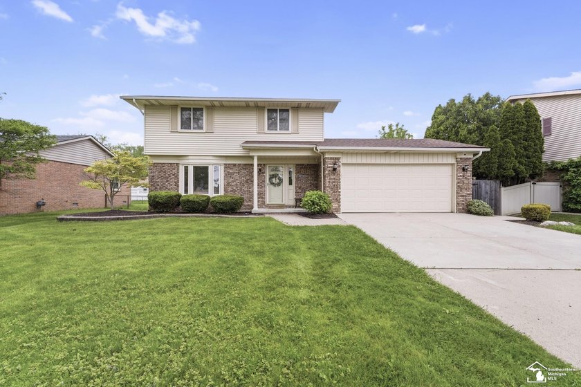 Welcome home to this beautifully updated, classic Colonial-style - Beach Home for sale in Rockwood, Michigan on Beachhouse.com