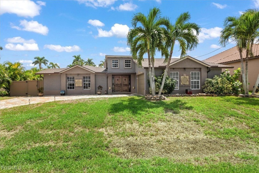 Location, location, location! With over 2600 square feet under - Beach Home for sale in Cape Coral, Florida on Beachhouse.com