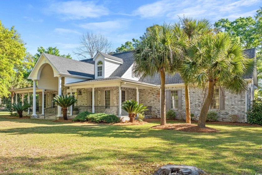 Welcome to this stunning low-country style, 5BD 4.5BA all-brick - Beach Home for sale in Murrells Inlet, South Carolina on Beachhouse.com