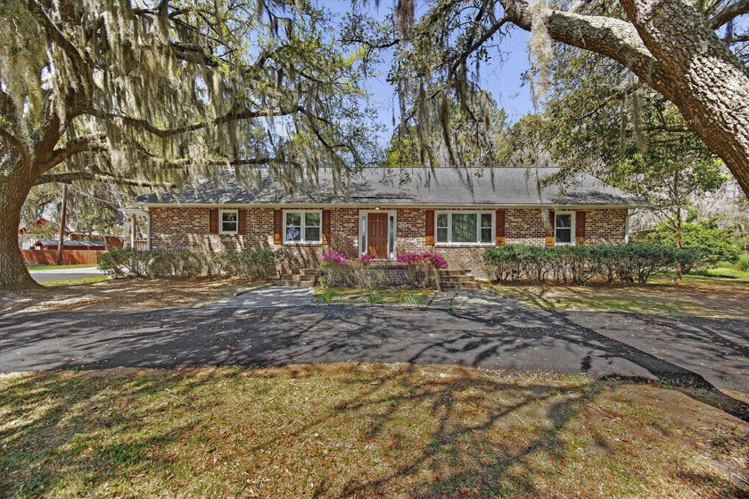 One-and-a-half-story brick ranch set on approximately 1.56 acres - Beach Home for sale in Meggett, South Carolina on Beachhouse.com
