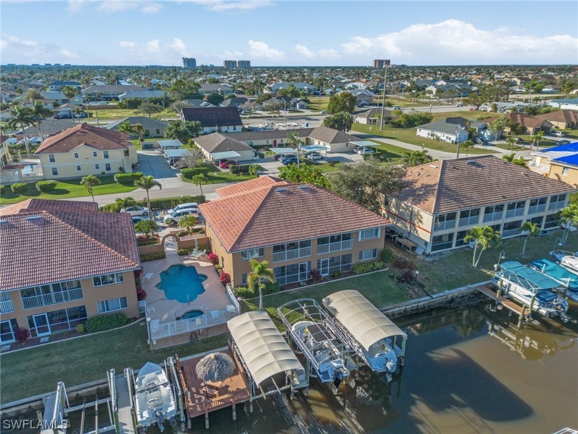 GULF ACCESS with one fixed bridge to open water!  BOAT LIFT and - Beach Condo for sale in Cape Coral, Florida on Beachhouse.com