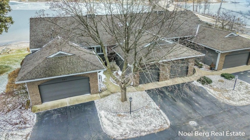 Bring your boat and enjoy this completely updated waterfront - Beach Condo for sale in Spring Lake, Michigan on Beachhouse.com