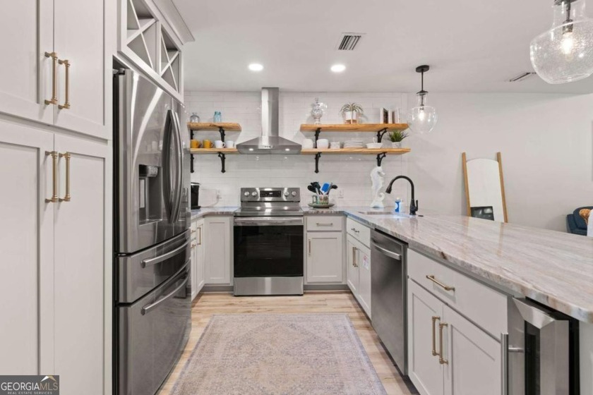 COASTAL CHARM MEETS MODERN ELEGANCE! Welcome to your dream - Beach Condo for sale in Saint Simons, Georgia on Beachhouse.com