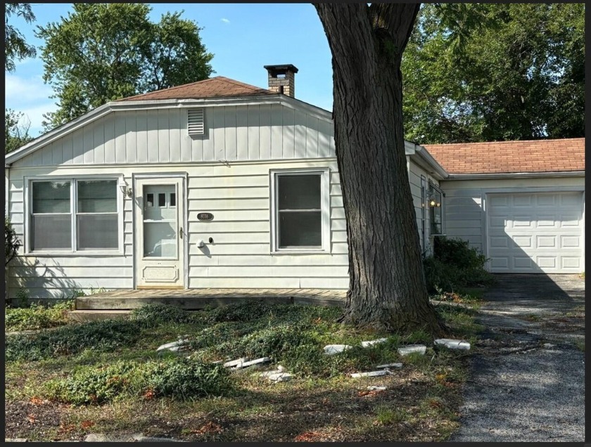 Located 448 feet from the beach, this 2 bedroom home with den - Beach Home for sale in Gary, Indiana on Beachhouse.com