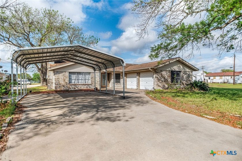Welcome home to this charming 3-bedroom, 2-bath residence with a - Beach Home for sale in Port Lavaca, Texas on Beachhouse.com