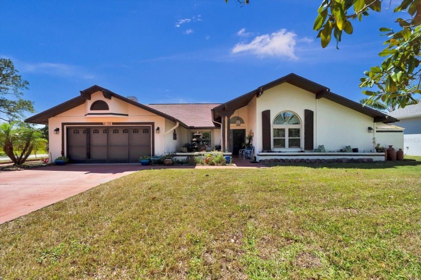 Welcome to 105 Colechester Ln, a spacious 4-bedroom, 2 and - Beach Home for sale in Palm Coast, Florida on Beachhouse.com