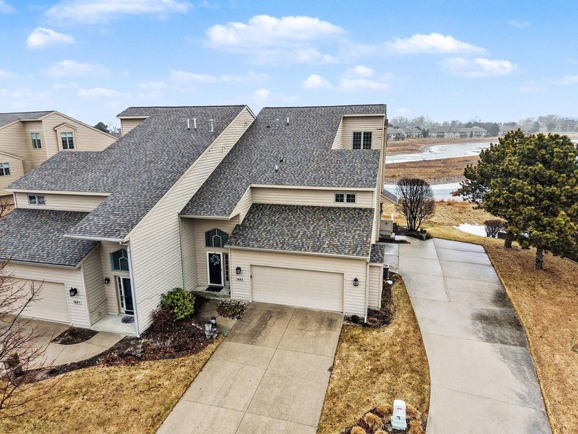Wake up to shimmering water views and settle into easy - Beach Condo for sale in Muskegon, Michigan on Beachhouse.com
