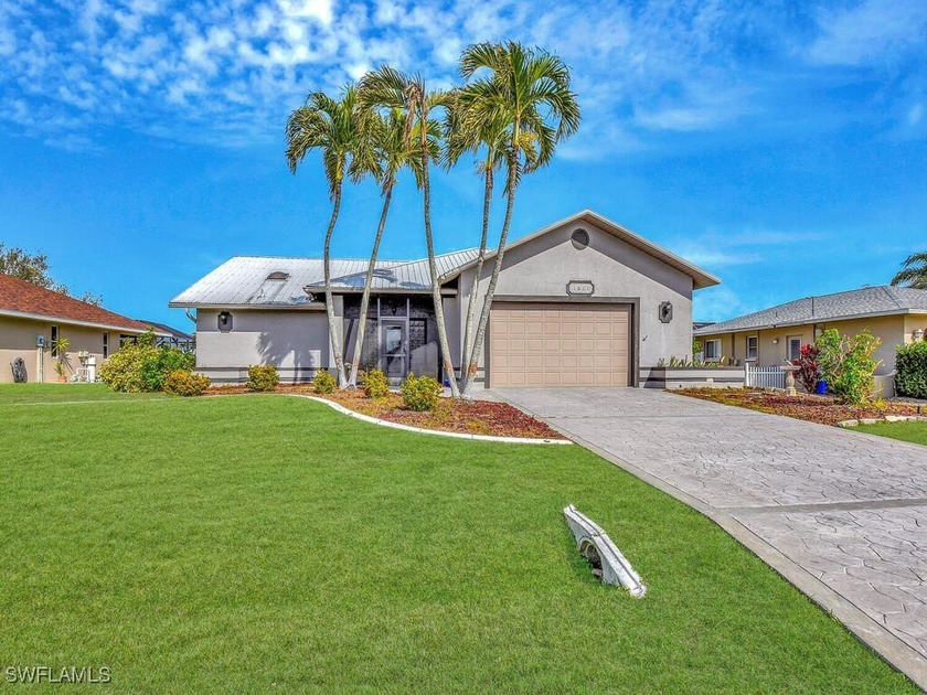 This beautifully maintained 3-bedroom, 2-bathroom pool home - Beach Home for sale in Cape Coral, Florida on Beachhouse.com