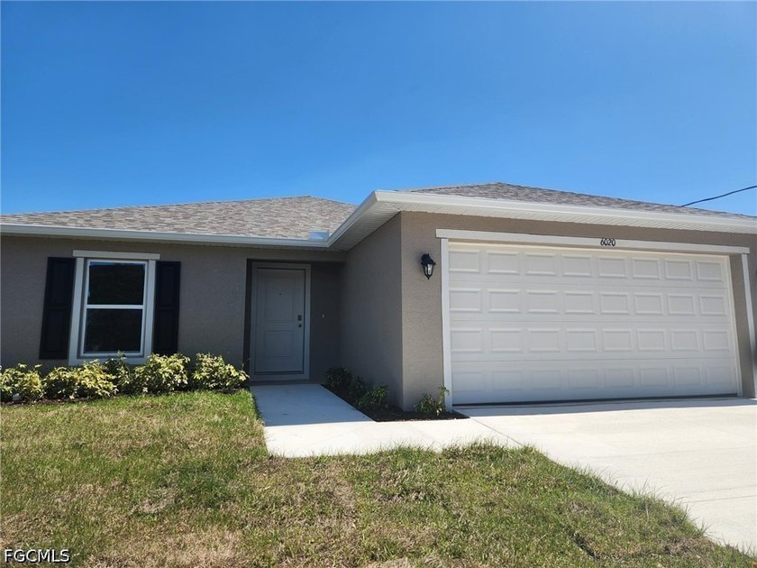 READY NOW! Quartz counter tops, tile floors in all common areas - Beach Home for sale in Lehigh Acres, Florida on Beachhouse.com