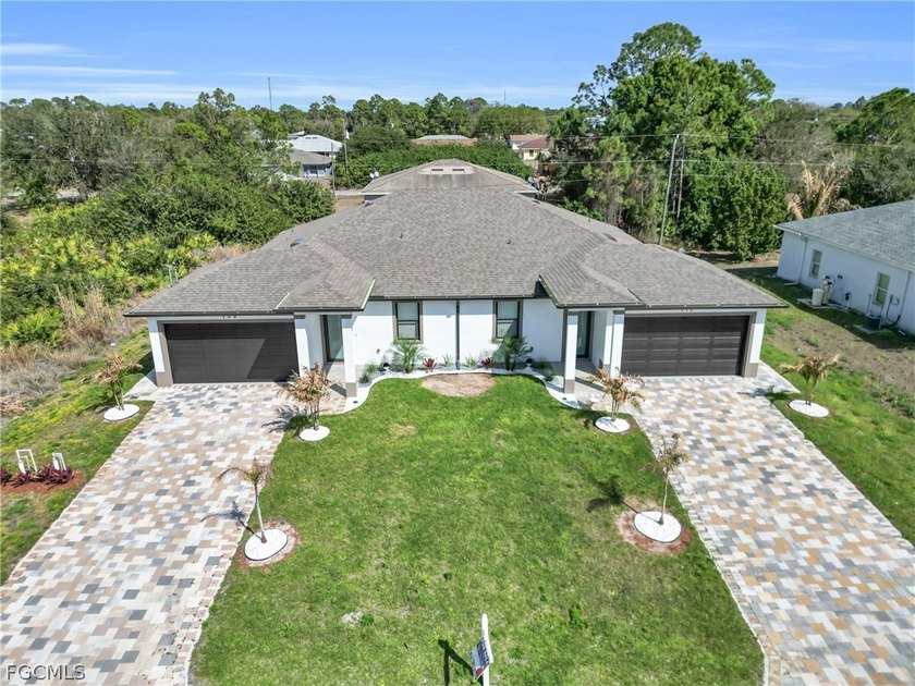 BRAND NEW 2025 construction duplex in Lehigh Acres with - Beach Home for sale in Lehigh Acres, Florida on Beachhouse.com