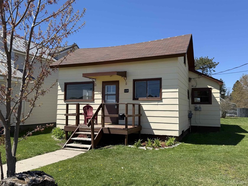 Sitting on a spacious lot on Manistique's West Side, this move - Beach Home for sale in Manistique, Michigan on Beachhouse.com
