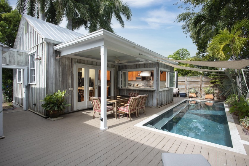 Situated on a corner lot, the two-home compound showcases two - Beach Home for sale in Key West, Florida on Beachhouse.com