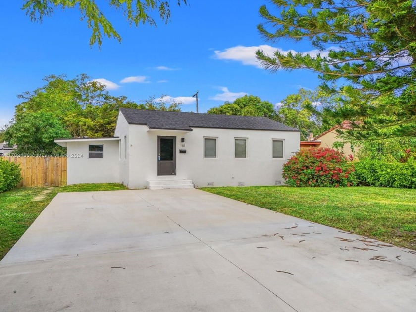 Offering this newly remodeled home in beautiful Miami Springs - Beach Home for sale in Miami Springs, Florida on Beachhouse.com