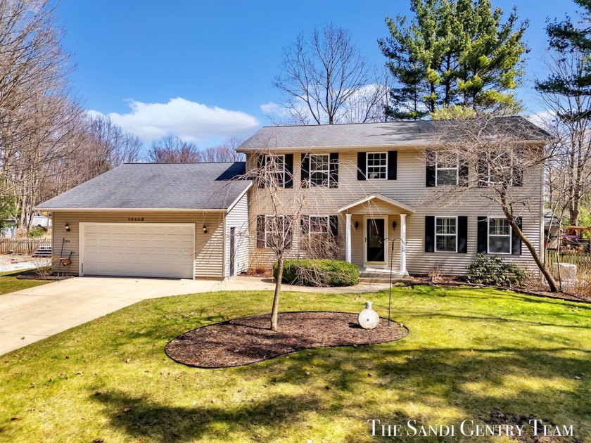 Welcome to this stunning 4-bedroom, 2.5-bathroom home, ideally - Beach Home for sale in West Olive, Michigan on Beachhouse.com