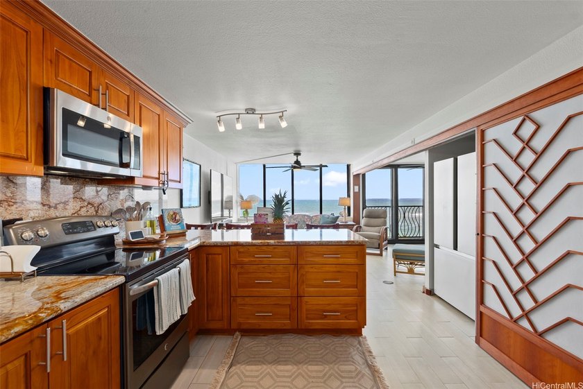 Enjoy front-row ocean views from this rarely available 2-bedroom - Beach Condo for sale in Waialua, Hawaii on Beachhouse.com