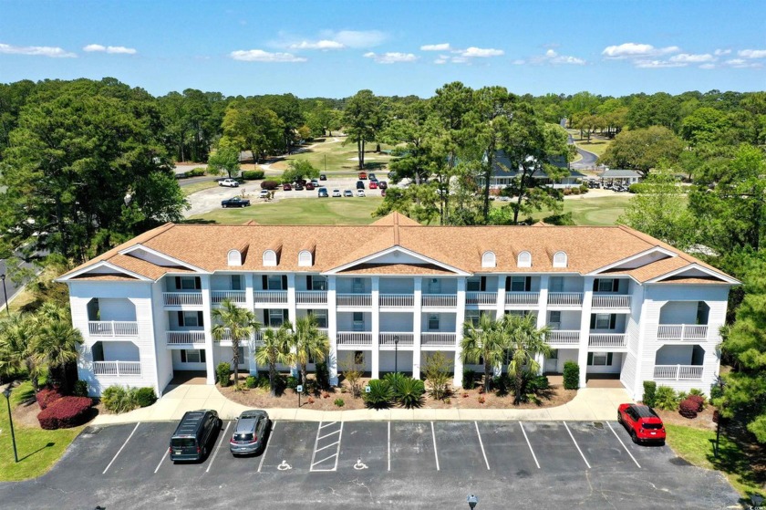 This beautiful FIRST FLOOR condo is located in the well known - Beach Condo for sale in Little River, South Carolina on Beachhouse.com