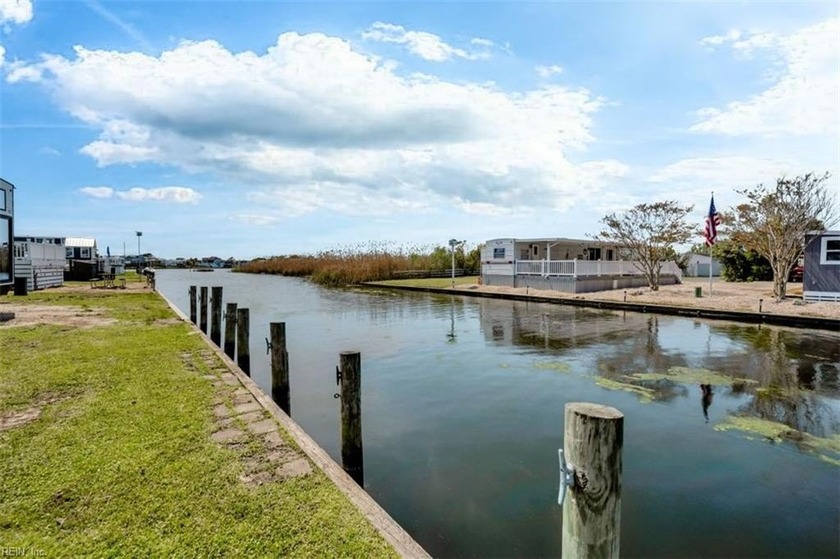 Experience the perfect blend of comfort and natural beauty on - Beach Lot for sale in Virginia Beach, Virginia on Beachhouse.com
