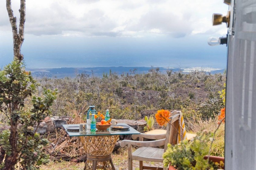 Welcome to this enchanting boho chic cabin, set on two acres of - Beach Home for sale in Ocean View, Hawaii on Beachhouse.com