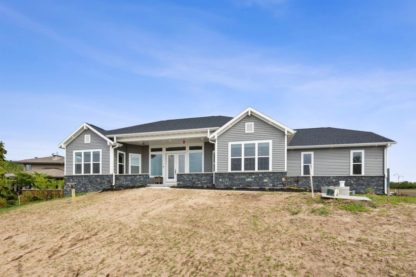 Beautifully built in Oct. 2024, this 4 BR, 2 BA ranch home on 1 - Beach Home for sale in Brussels, Wisconsin on Beachhouse.com