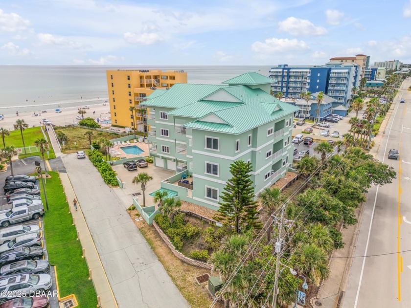 This stunning oceanfront 3-bedroom 2250 square foot, 2 car - Beach Condo for sale in New Smyrna Beach, Florida on Beachhouse.com