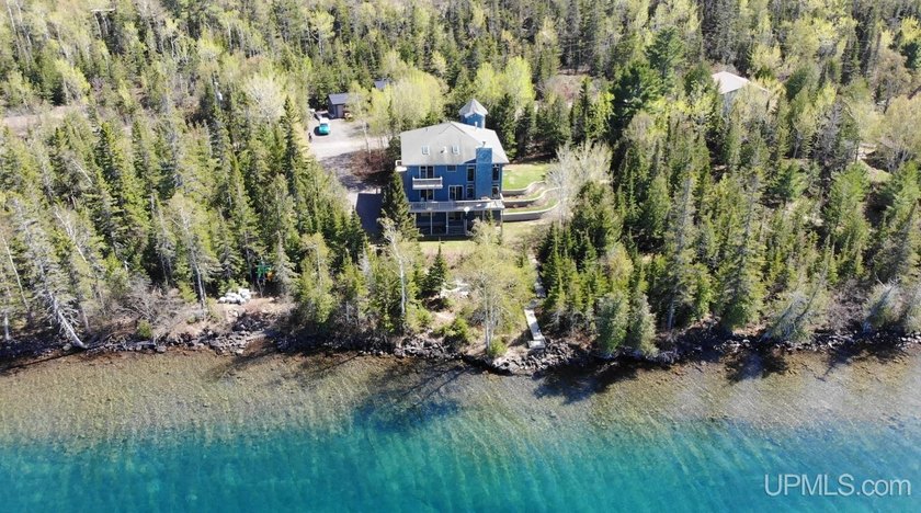Experience the rare beauty and serenity of this extraordinary - Beach Home for sale in Eagle Harbor, Michigan on Beachhouse.com
