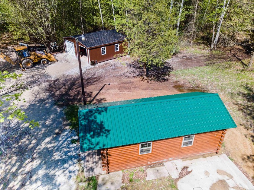 Nestled on a beautiful wooded property just 1/4 mile from the - Beach Acreage for sale in Applegate, Michigan on Beachhouse.com